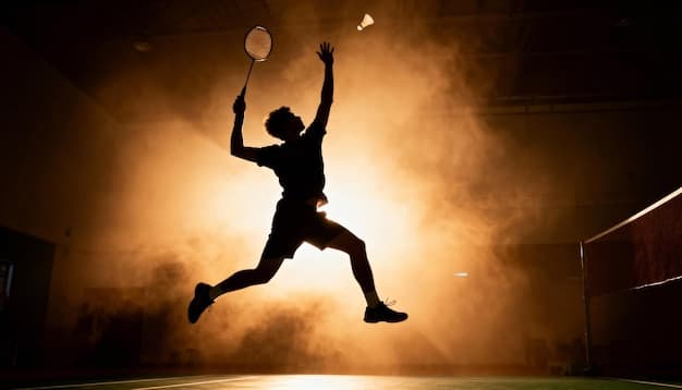 Badminton player performing a powerful smash